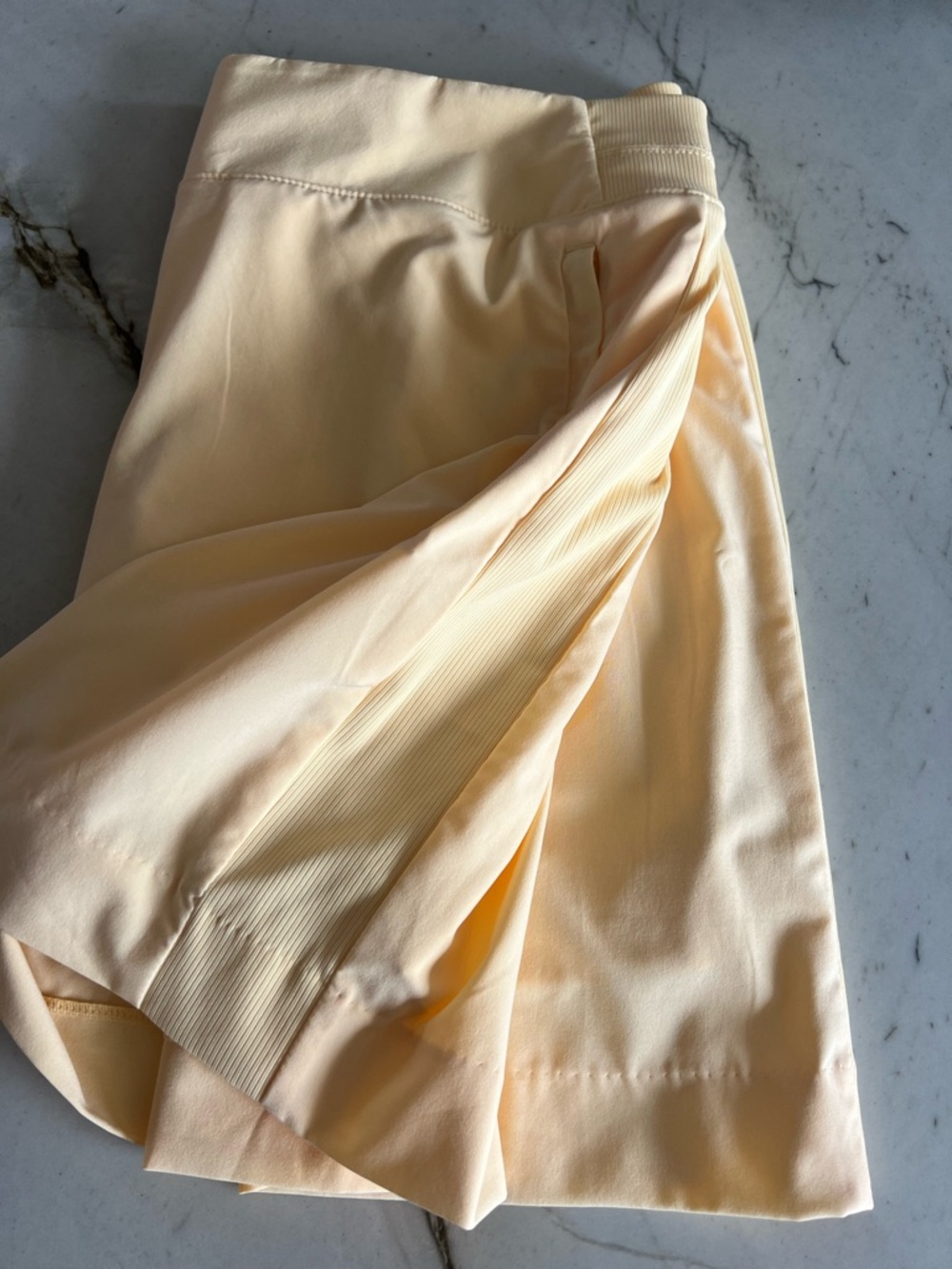 Athleta Pale Yellow Skort with Hidden Zip Pockets